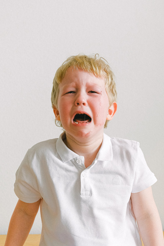 Boy crying. Stay calm during your child's meltdown.
