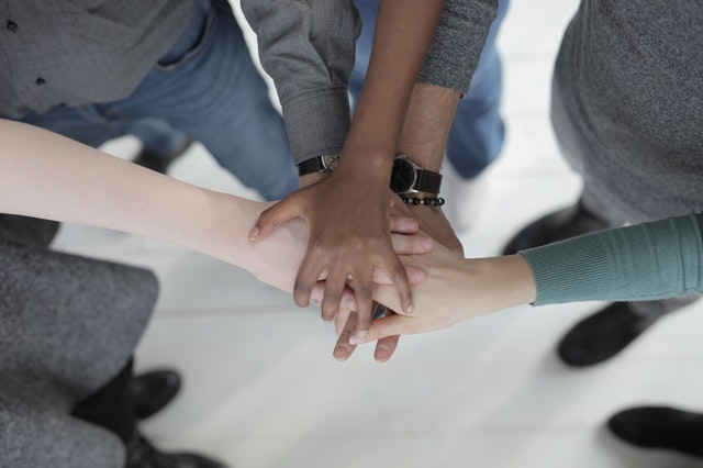 Group hands. Should you join an autism support group?