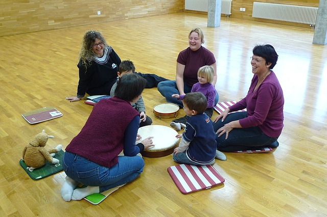 Group of music therapists and children. 