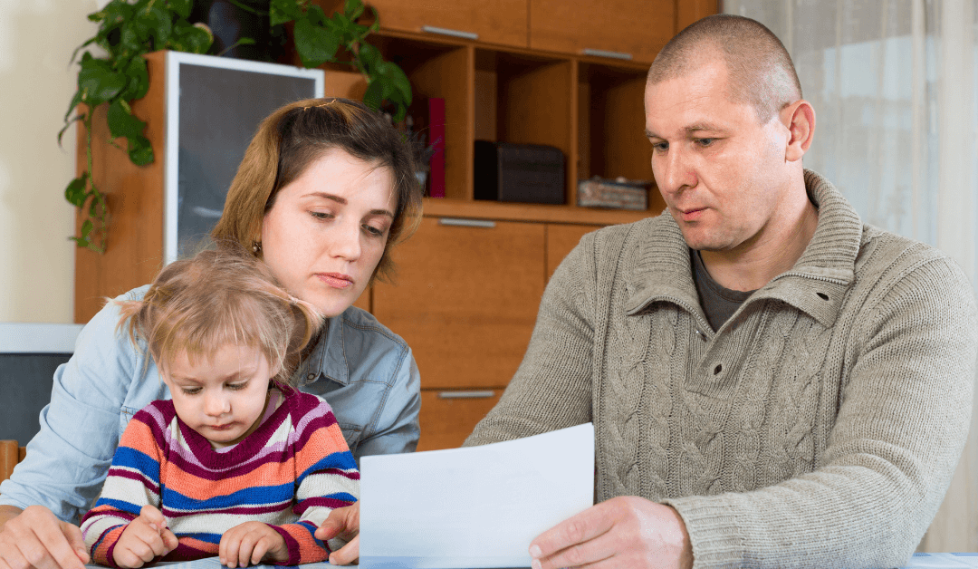 Family looking at form.