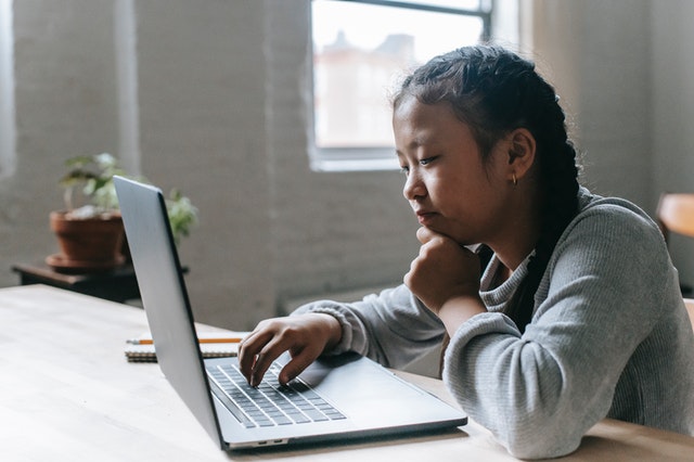 Tween girl on computer. 