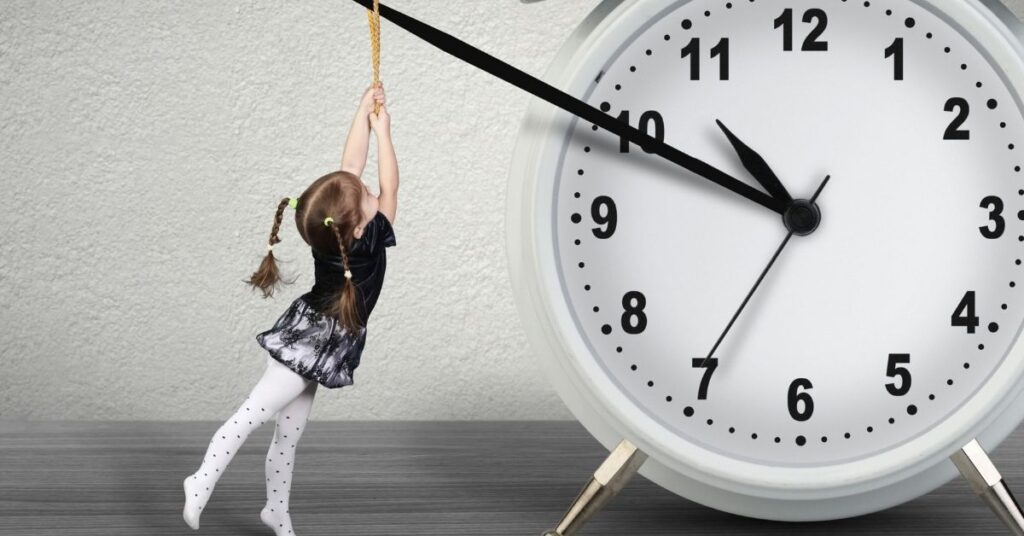 Girl with a large clock. Teach your child with autism and ADHD executive function skills.