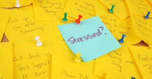 Post it note with "stressed" written on it.