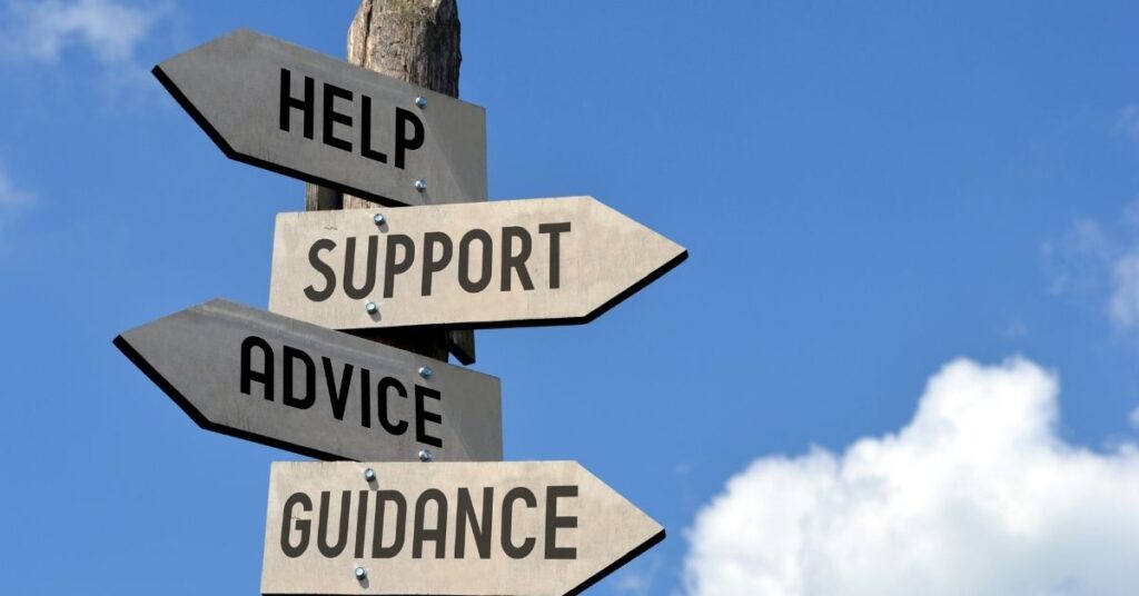 Street direction signs that say help, support, advice and guidance. How can supported decision-making be a good alternative to guardianship for your young adult with autism?