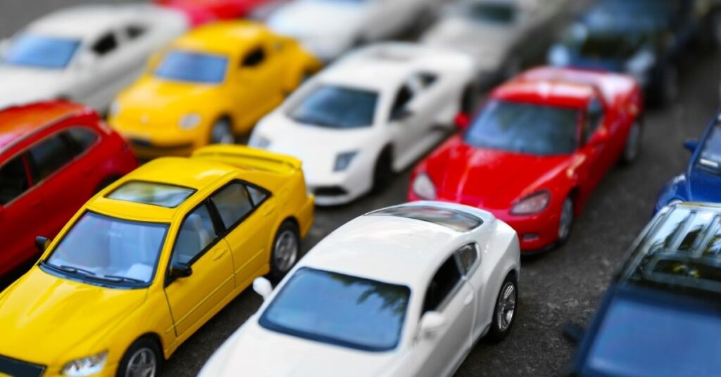 Toy cars lined up. Should you encourage or discourage your autistic child's stimming?