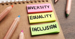 Post-it notes that say "Diversity," "Equality" and "Inclusion." When should your teen disclose they have autism?