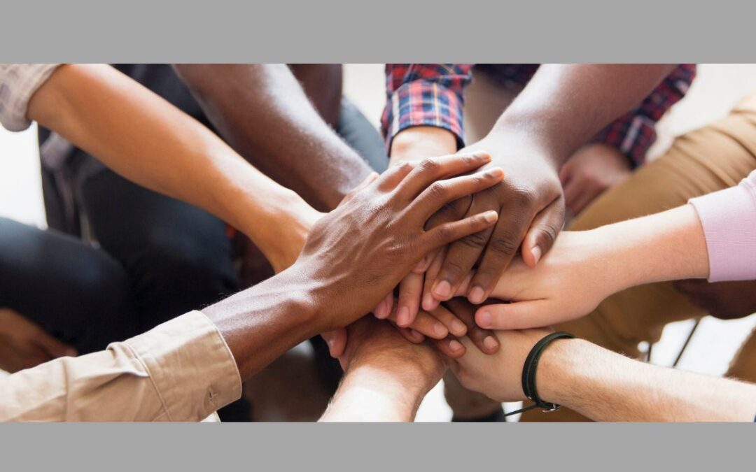 Group of hands piled together